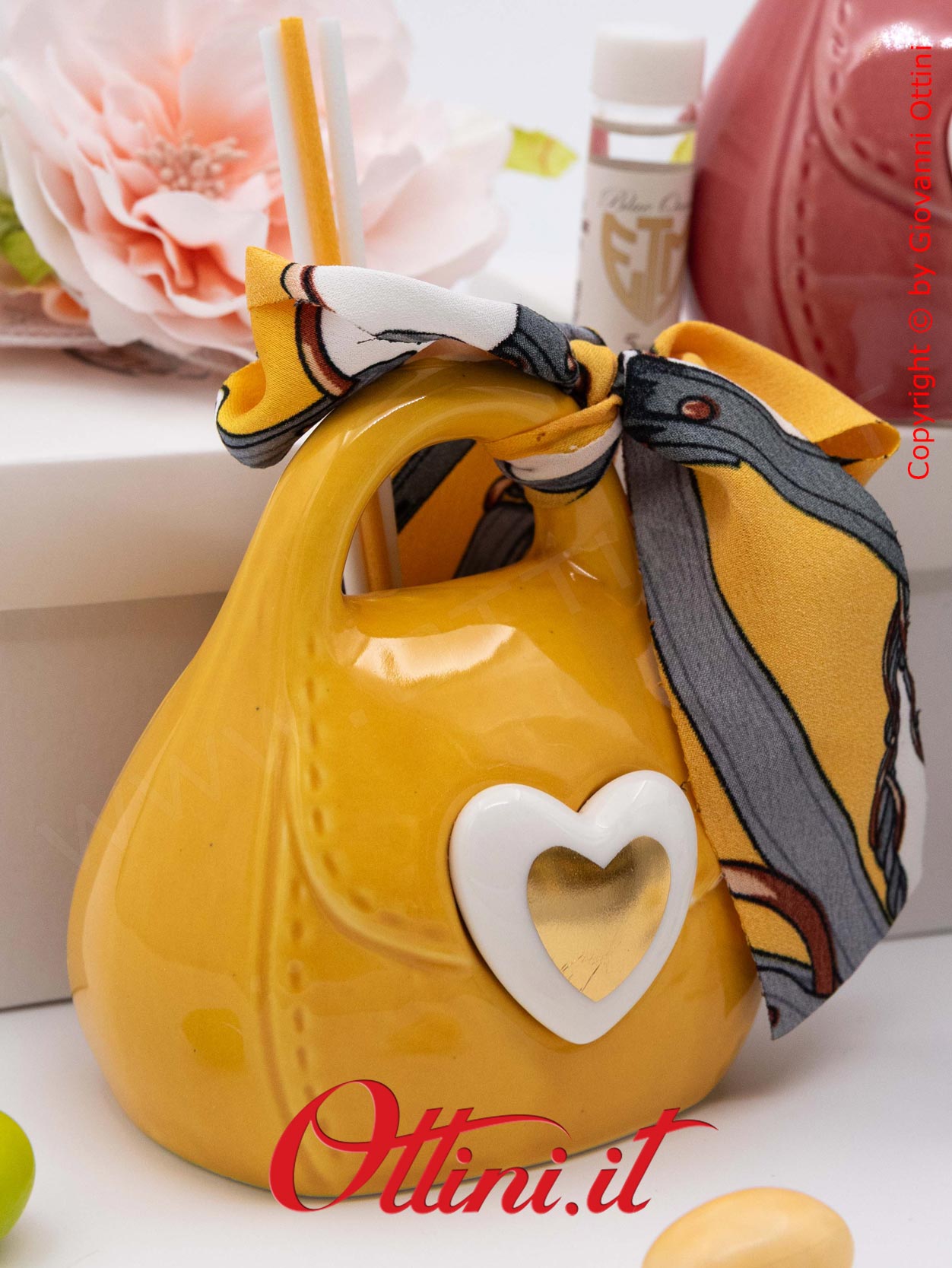 02A430 - il Profumatore Borsetta 3 Colori con Confezione è un diffusore per ambienti dai colori vivaci dedicata alle teenager che seguono la moda