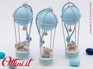 La magia di una Mongolfiera, il simbolo della leggerezza, il colore del cielo e il piccolo orsetto che rappresenta la dolcezza e l'amore di un bambino